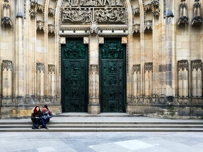 Friends sitting st vitus cathedral photo