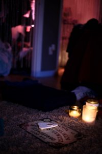 white candle on brown table photo