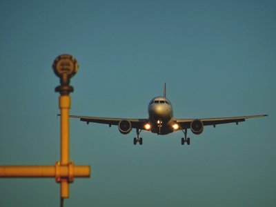 flying gray airplane