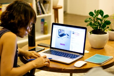 woman browsing on her laptop
