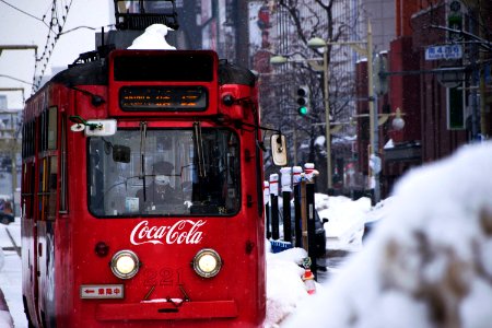red Coca-Cola tram during snow photo