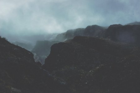 landscape photography of mountains covered in fog photo