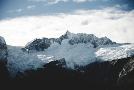 mountains under snow during daytime photo