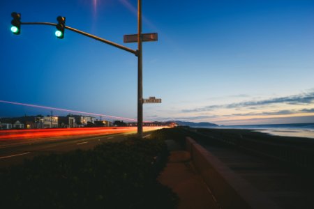 traffic light turned into green near baywalk during daytime photo