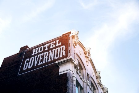 hotel governor building at daytime low angle photography