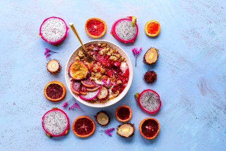 round white ceramic bowl filled with fruits photo