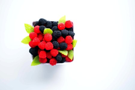 bowl of red and black berries photo