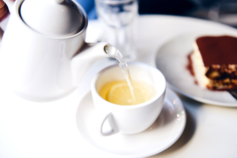 white ceramic teapot and teacup photo