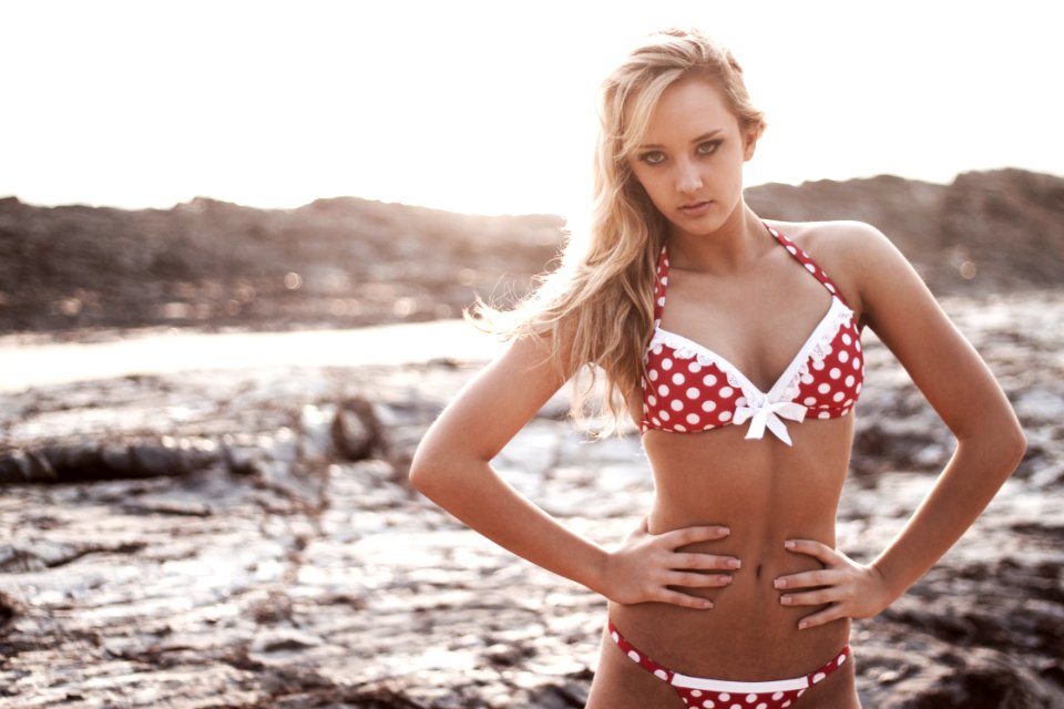 selective focus photo of woman wearing white-and-red bikini