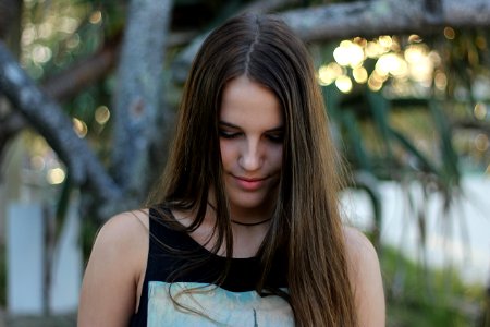 smiling woman looking down