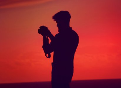 silhouette of man talking picture photo