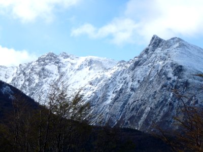 snow coated mountain during daytime photo