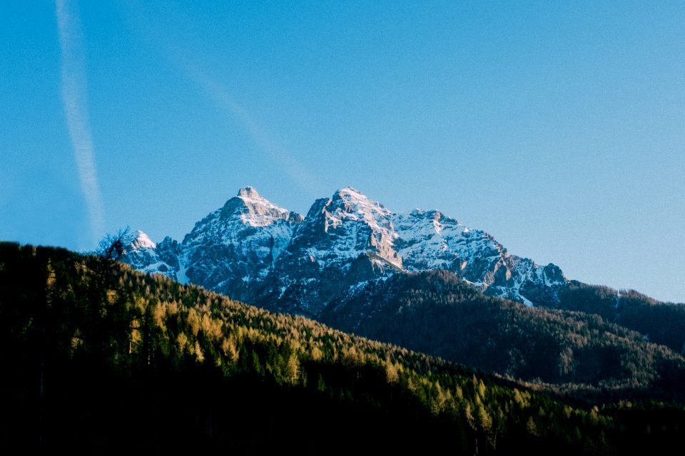 snow covered mountain during daytime