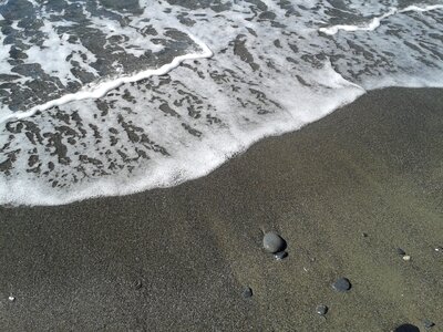 Sand water wave photo