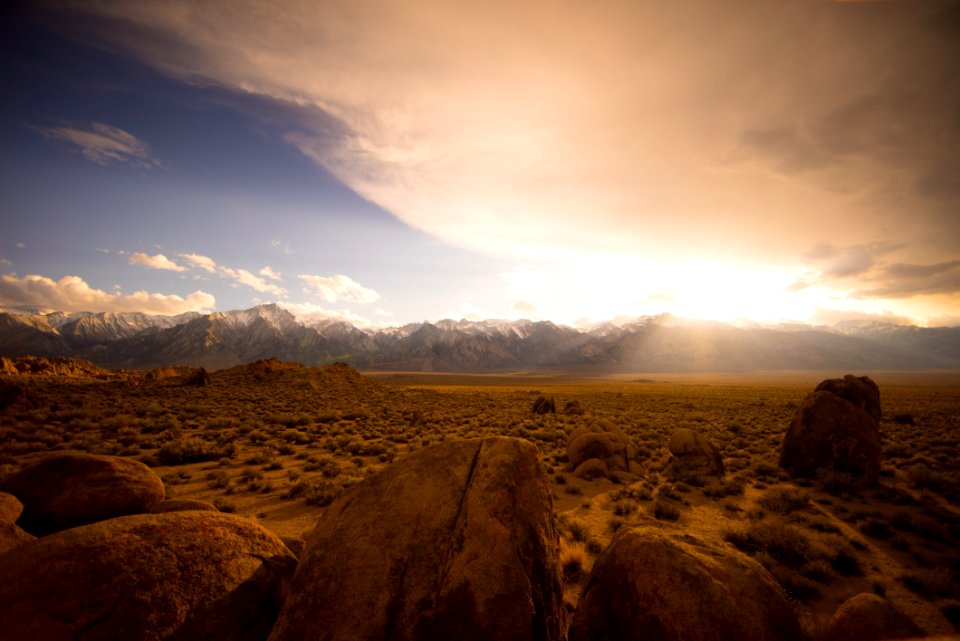 brown desert under cloudy sky