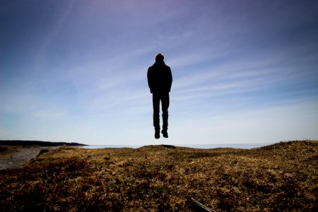 silhouette on floating man photo