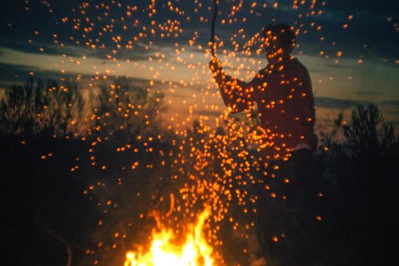 man playing bone fire