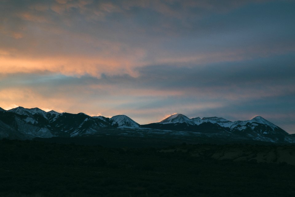 aerial photography of mountain at sunset