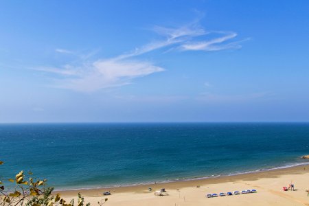 aerial photography of body of water and sand photo