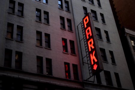 red Park light signage on gray concrete building