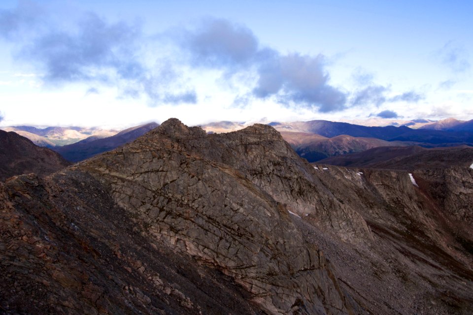 brown rock cliffs under blue sky photo