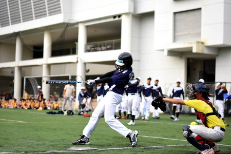 baseball players playing baseball on baseball field photo