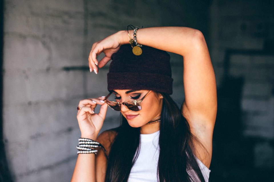 woman put left hand on head