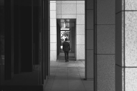 man walking on hallway photo