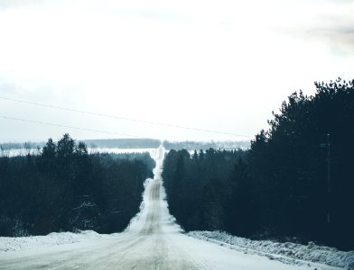 road under white sky