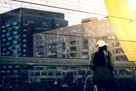 woman standing and looking buildings photo