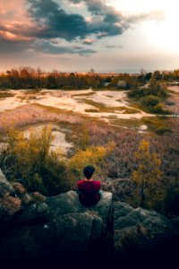 man siting on rocks