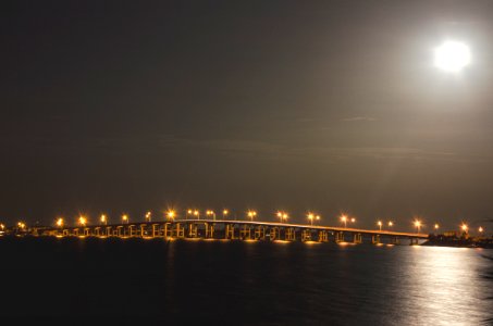 brown bridge with lights at dayttime
