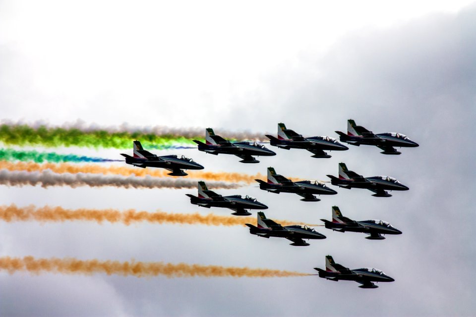 black jetpanes under white clouds