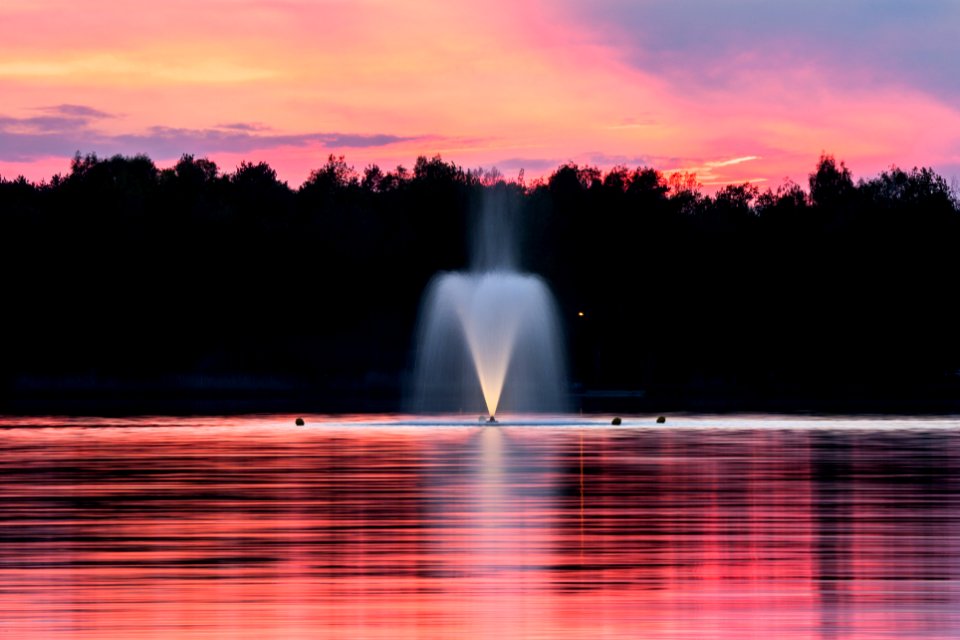water fountain during sunset