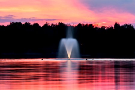 water fountain during sunset