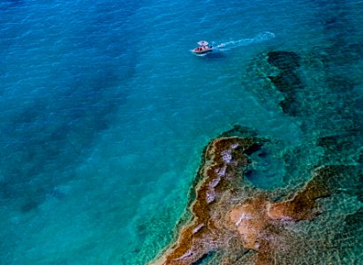 aerial photography of boat on body of water photo