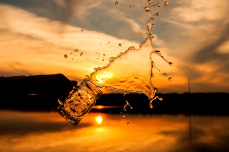 silhouette photo of splash of water photo