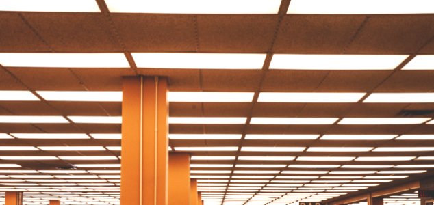 white window blinds on brown wooden frame