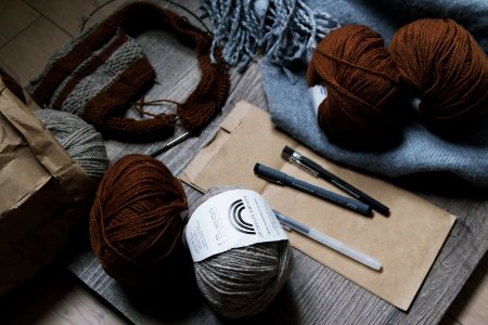 brown yarns and three balls photo