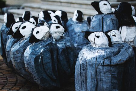 Together penguins carve
