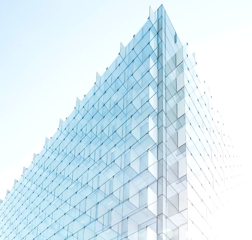 glass building under clear blue sky