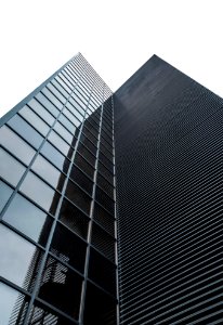 low angle photography of black glass building photo