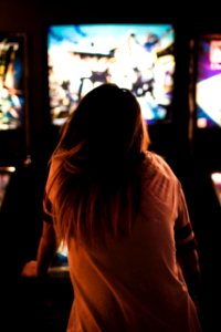 woman playing arcade photo