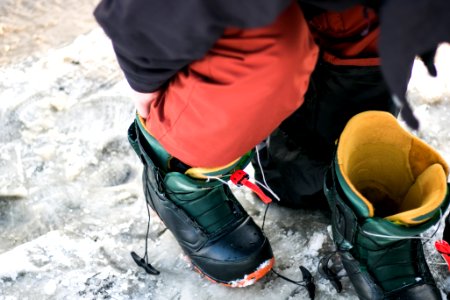 person wearing black boots