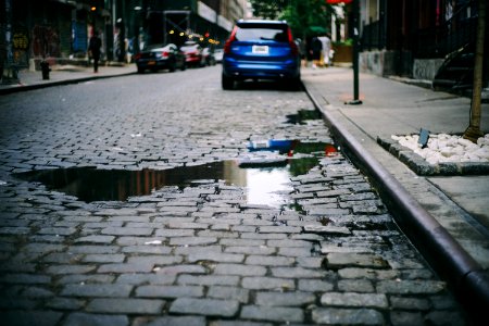 cars parked beside the sidewalk during day time photo