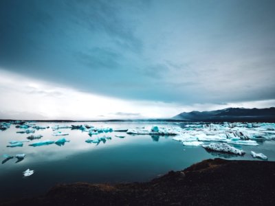 ice bergs on body of water