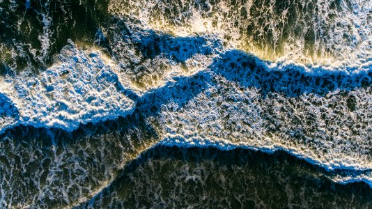 aerial photography of ocean wave view during daytime photo