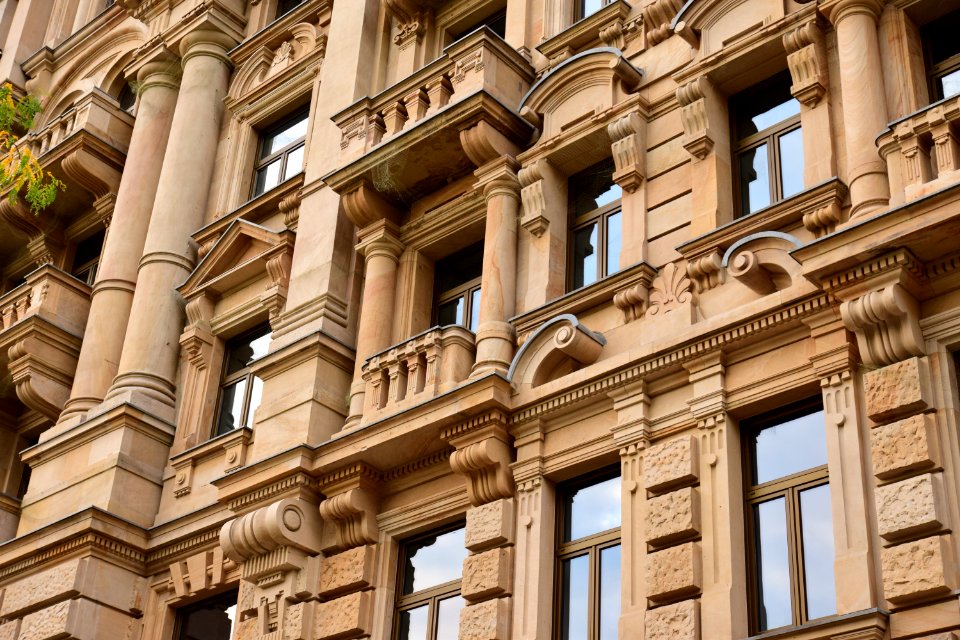 low angle photo of brown painted high rise building
