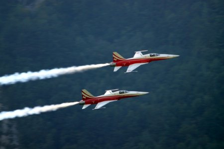 two red-and-white jet planes on air photo
