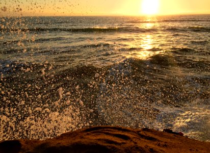time lapse photography of sea wave splash during golden hour